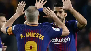 Andrés Iniesta y Luis Suárez
