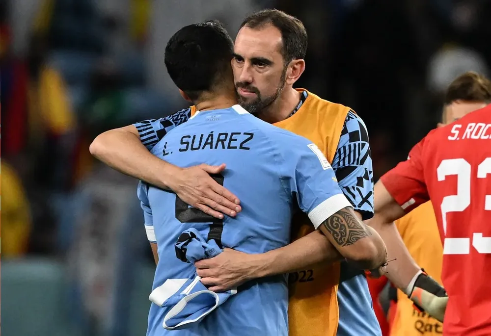 Godín y Suárez durante el Mundial
