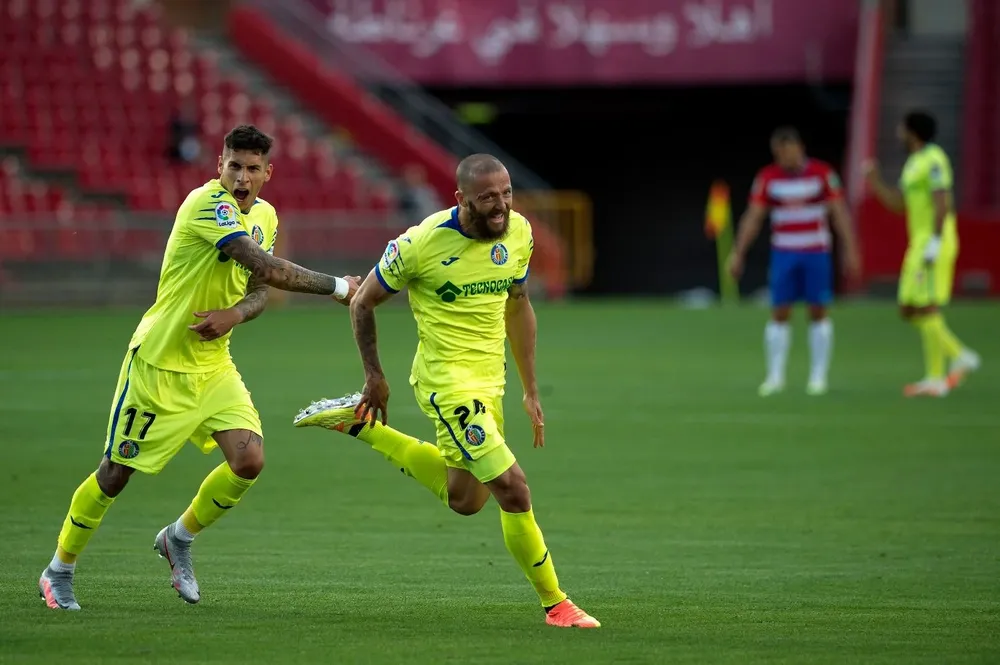 Olivera festeja con David Timor