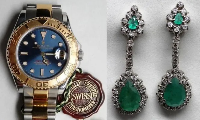 Un reloj Rolex Yacht - Master y un par de caravanas de brillantes y esmeraldas