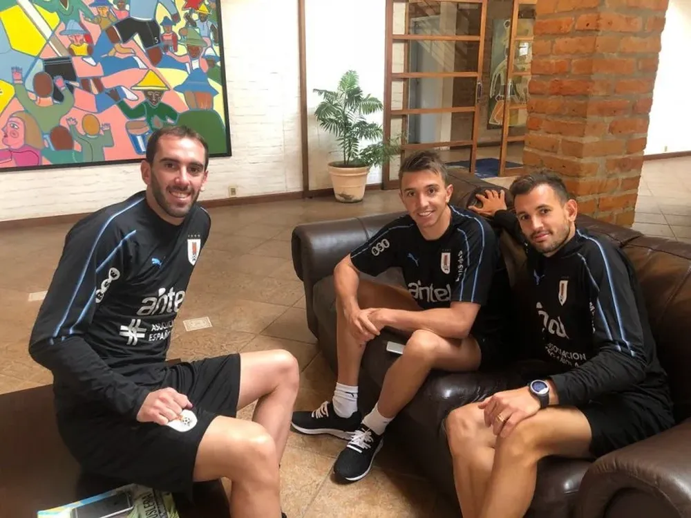 Godín, Muslera y Stuani de charla
