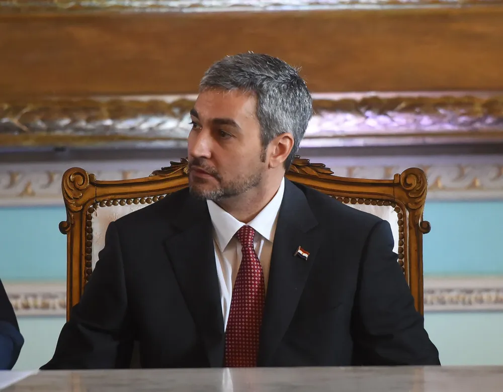 Paraguayan President Mario Abdo Benitez attends the commemoration of Childrens Day on his first day as president at the government palace in Asuncion on August 16, 2018.           Mario Abdo Benitez took office Wednesday as Paraguays new president, four months after playing down close family ties with the South American countrys late dictator to win a tight election race. / AFP / NORBERTO DUARTE