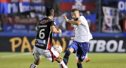 Nicolás López y Cristian González en el partido jugado en el Parque