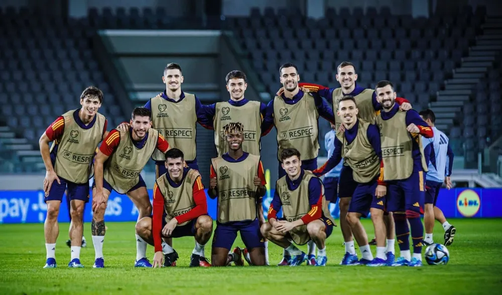 España buscar clasificar líder.