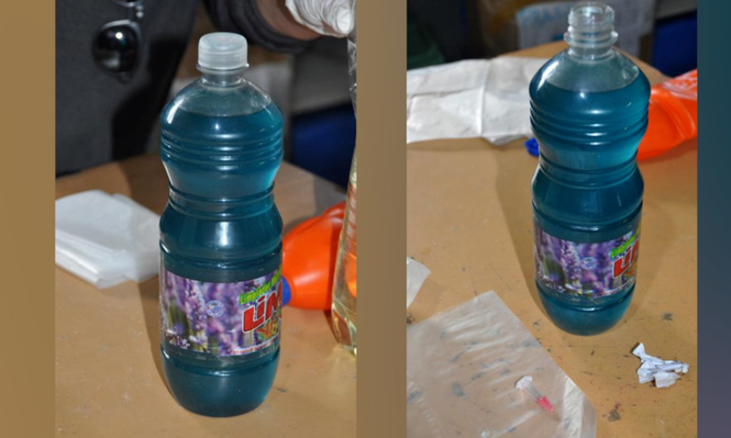 Botella plástica con cocaína disuelta