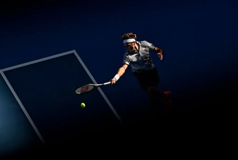 Federer superó a Rubin y avanzó a tercera ronda