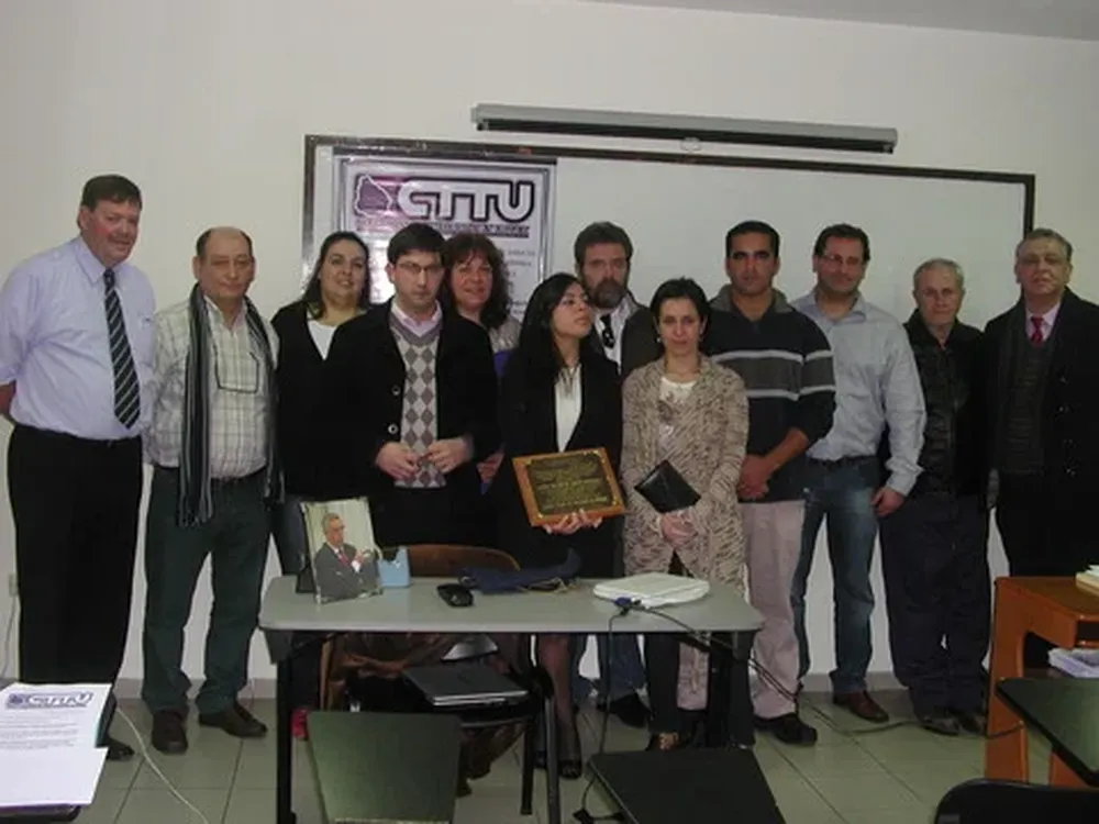 La directiva del CTTU junto a los hijos del rematador Lucas de Armas