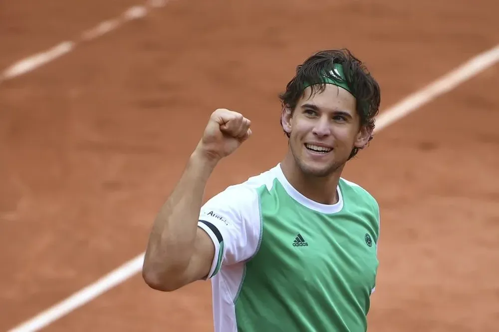 Thiem festeja su triunfo ante Djokovic