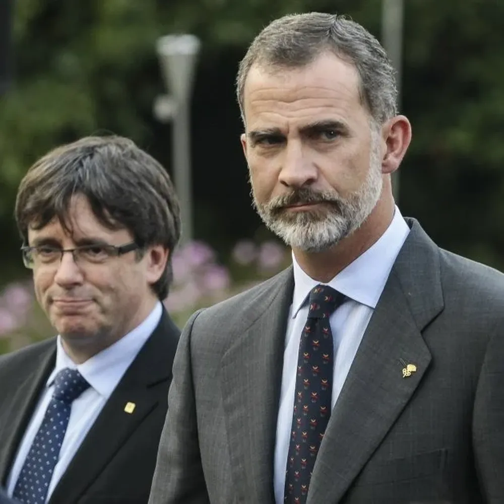 Rey Felipe VI y Carles Puigdemont
