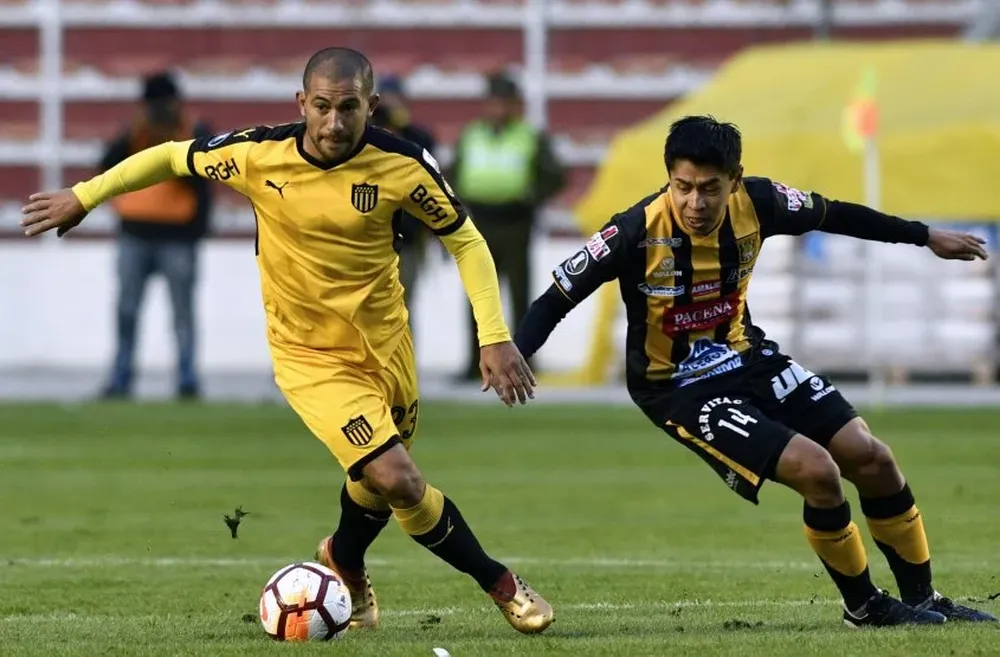 Walter Gargano y Diego Wayar