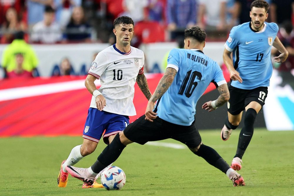 Christian Pulisic y Mathias Olivera
