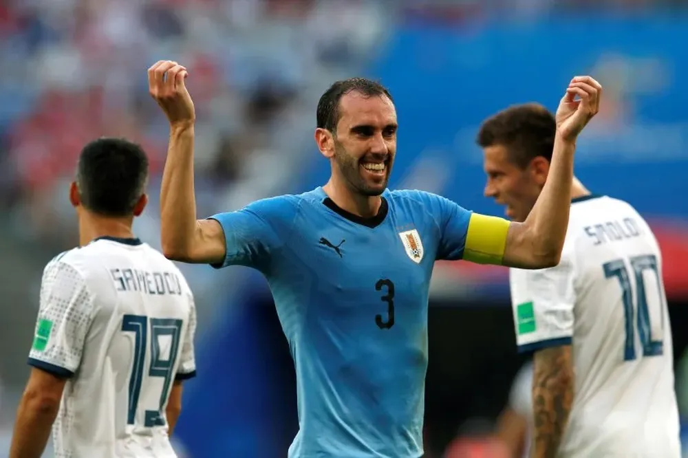 Godín con la cinta de capitán