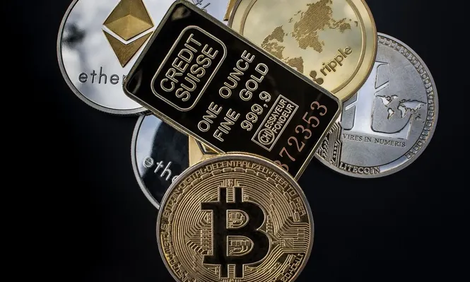 A diferencia de las criptomonedas, la moneda digital británica sería regulada por el banco central.