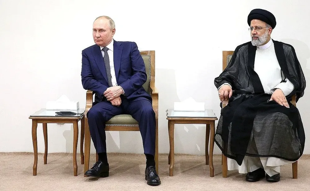 El presidente ruso, Vladimir Putin con su homólogo iraní, Ebrahim Raisi.