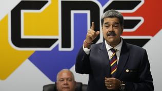 Maduro con el presidente del Consejo Nacional Electoral, Elvis Amoroso, un histórico partidario chavista.
