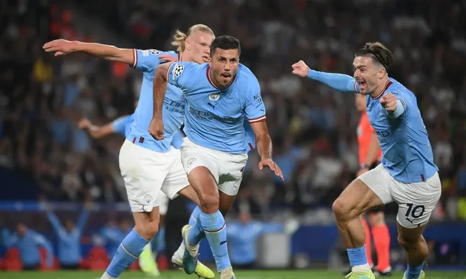 Rodri festeja su gol con Grealish y Haaland