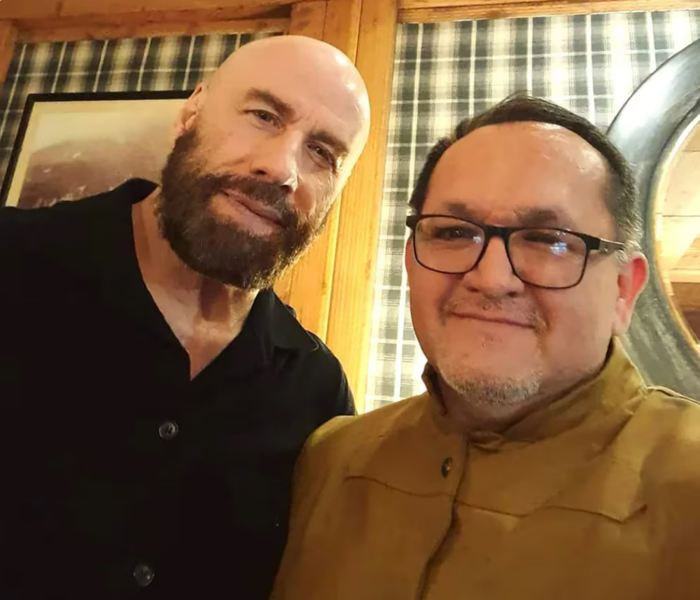 John Travolta junto a un fan argentino, Guido Wilson Cáceres Acevedo.
