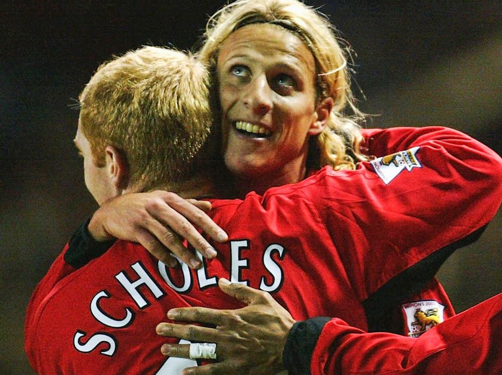Diego Forlán y Paul Scholes en Manchester United