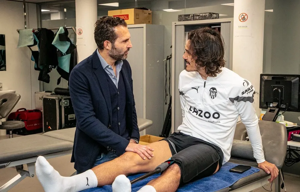 Ruben Baraja y Edinson Cavani