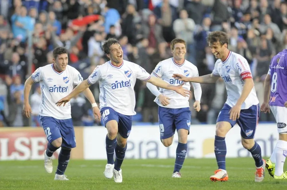 Espino, Fernández, Romero y Alonso, Nacional fue puro festejo