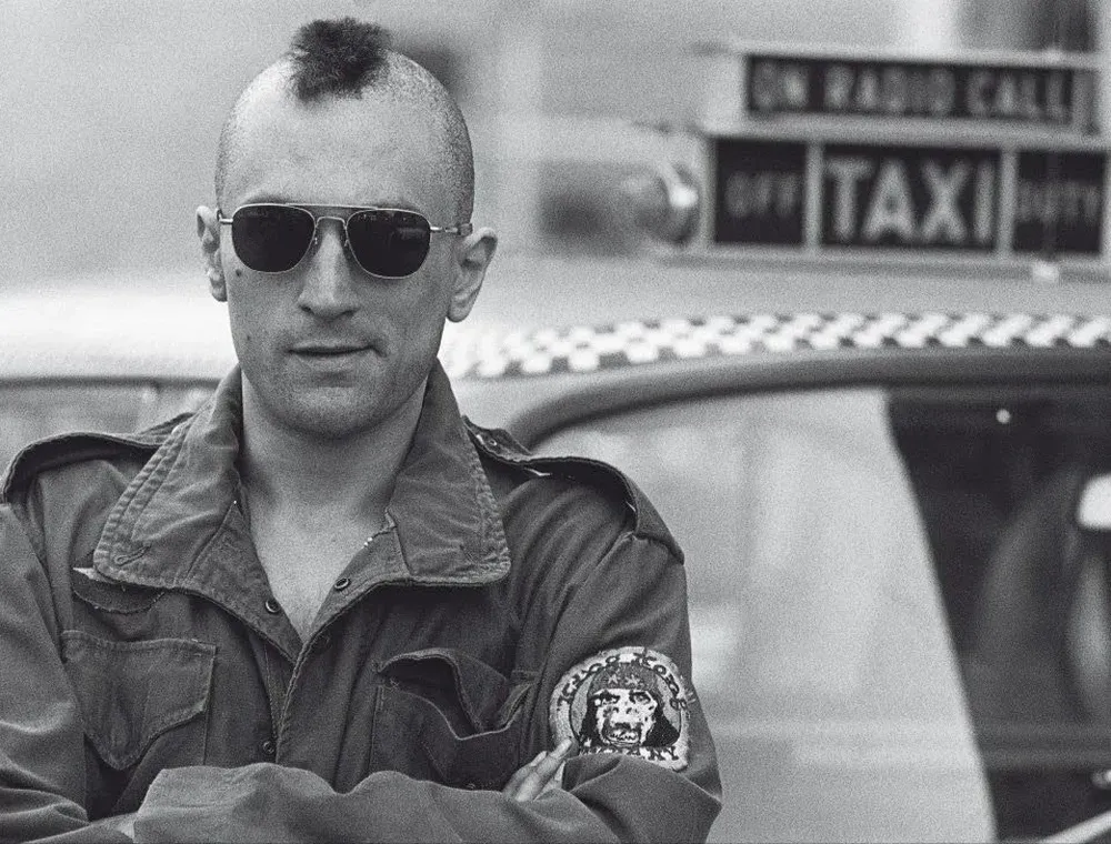 Robert De Niro como Travis Bickle
