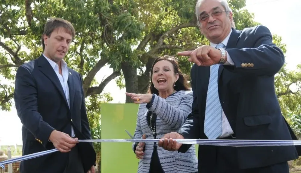 Reilly, Olivera y Benech durante el acto inaugural