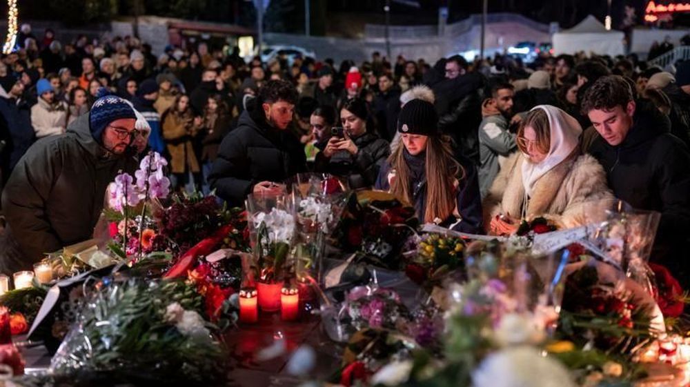 El jueves en la noche varias personas se reunieron para una vigilia en homenaje a las víctimas