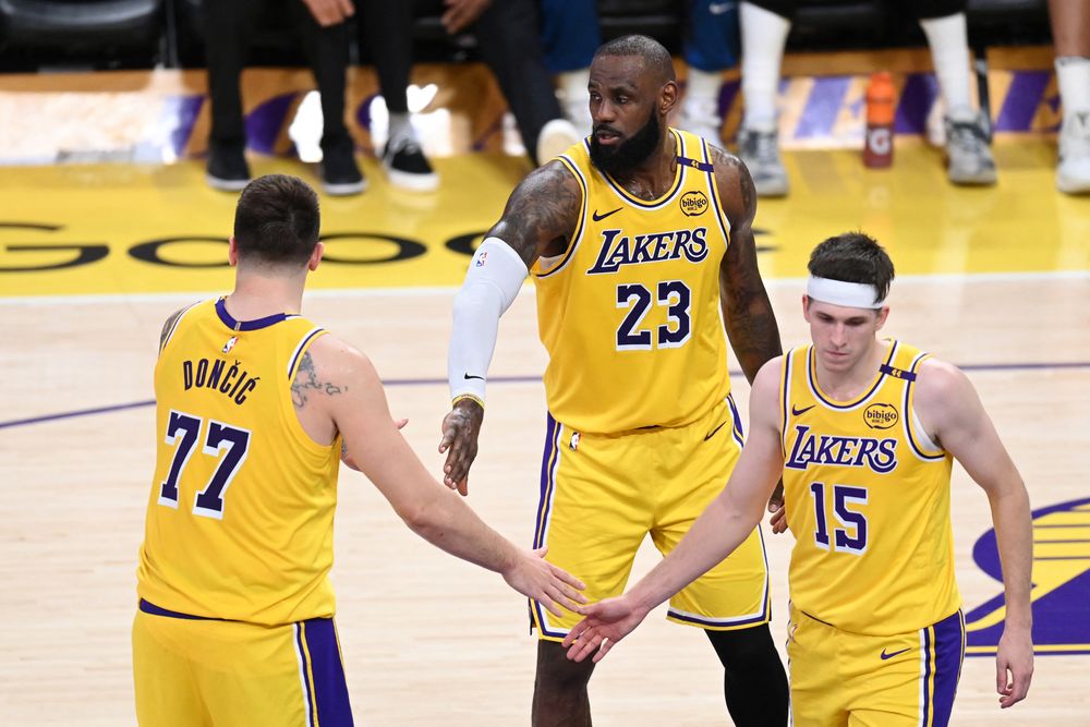 Luka Doncic, LeBron James y Austin Reaves Luka Doncic, LeBron James y Austin Reaves