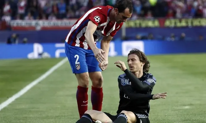 Diego Godín y Luka Modric