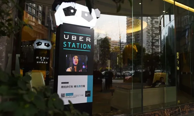 Uber renuncia al mercado chino y se fusiona con su rival local