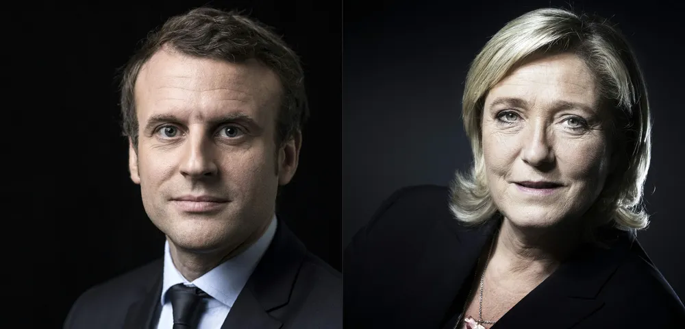 A combination of pictures made on April 23, 2017 shows French presidential election candidate for the En Marche ! movement Emmanuel Macron (L) and French presidential election candidate for the far-right Front National (FN) party Marine Le Pen (R) posing in Paris. Far-right leader Marine Le Pen and centrist Emmanuel Macron were on course April 23 to qualify for the runoff in Frances presidential election, initial projections suggested.  / AFP / Eric FEFERBERG AND JOEL SAGET