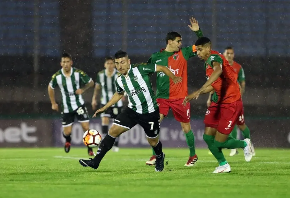 Marcelo Torres y Ronald Araújo