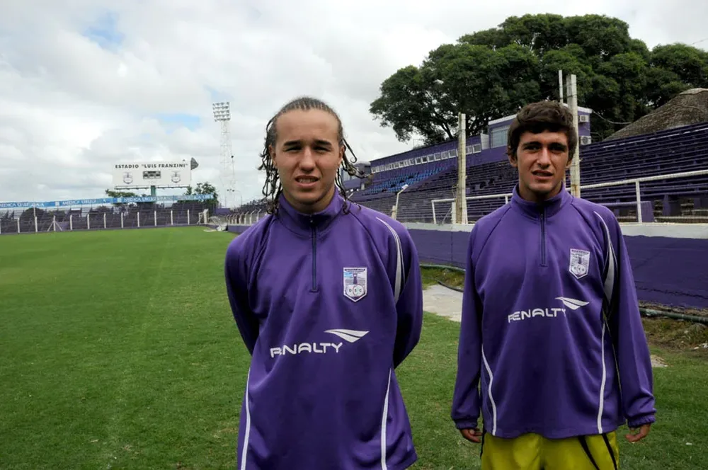 Diego Laxalt y Giorgian De Arrascaeta