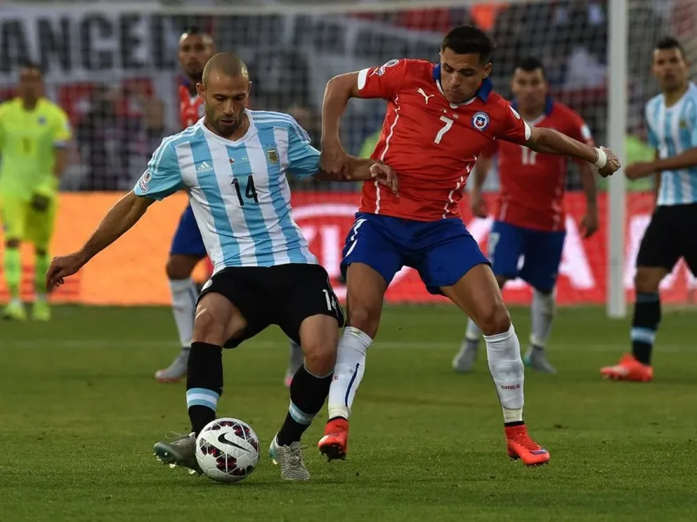 Javier Mascherano y Alexis Sánchez