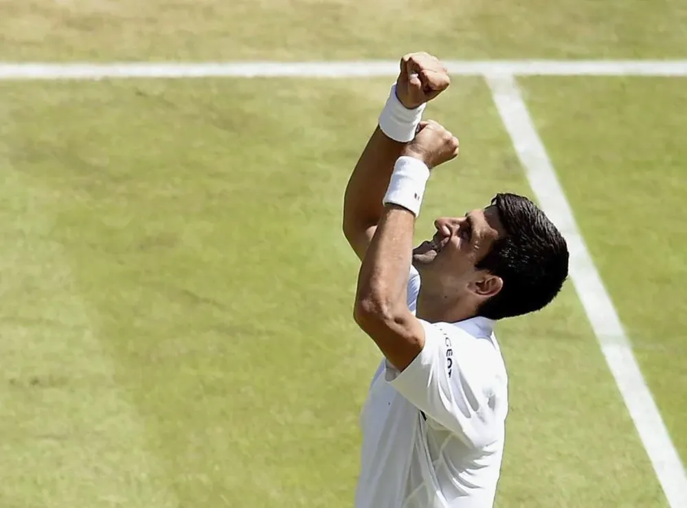 Djokovic festeja el triunfo sobre Gasquet.