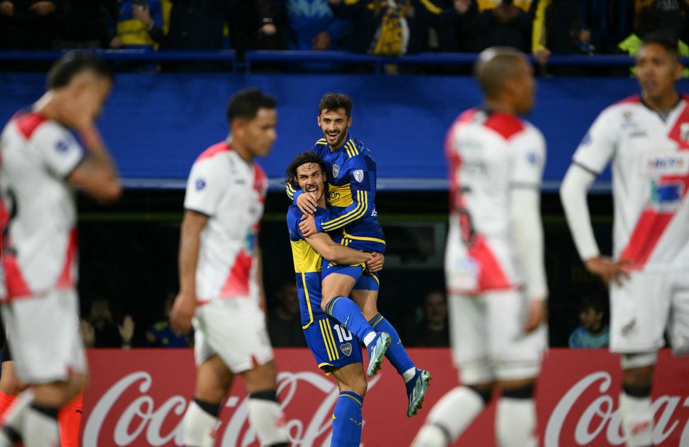 Edinson Cavani y Marcelo Saracchi