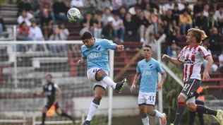 Luis Suárez y el paraguayo Walter Clar