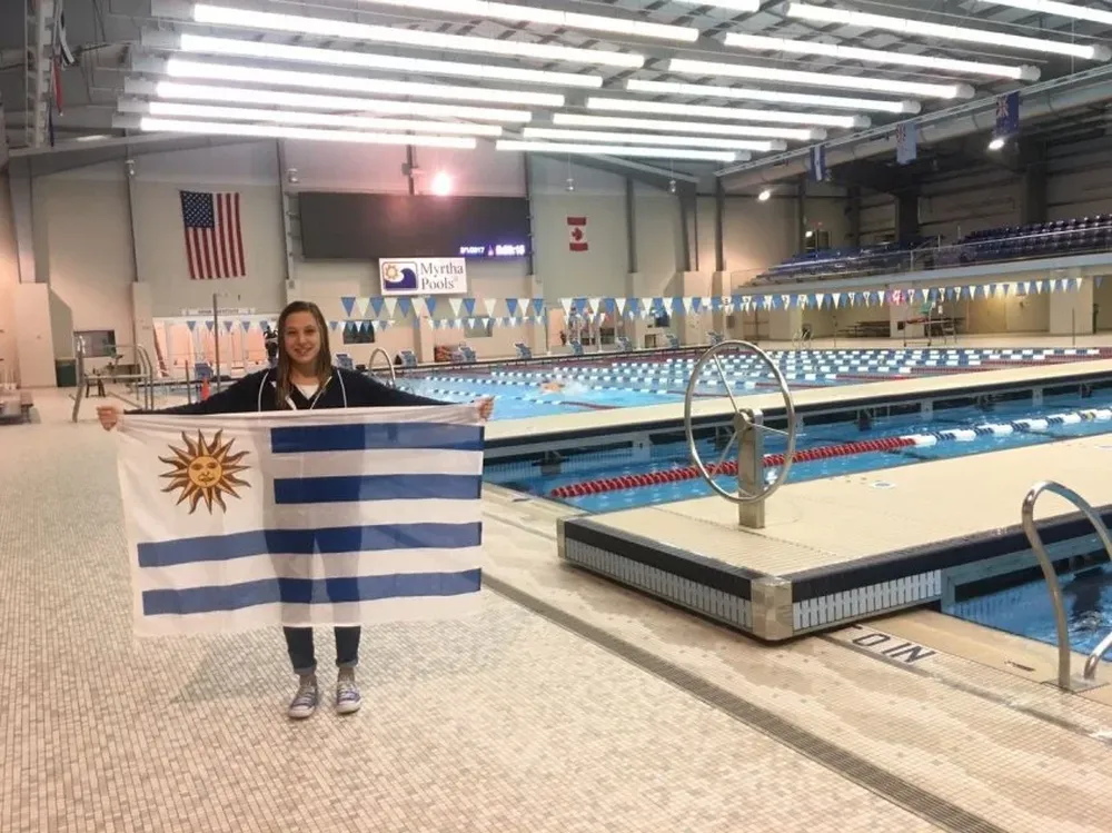 Martina junto a su entrenador.
