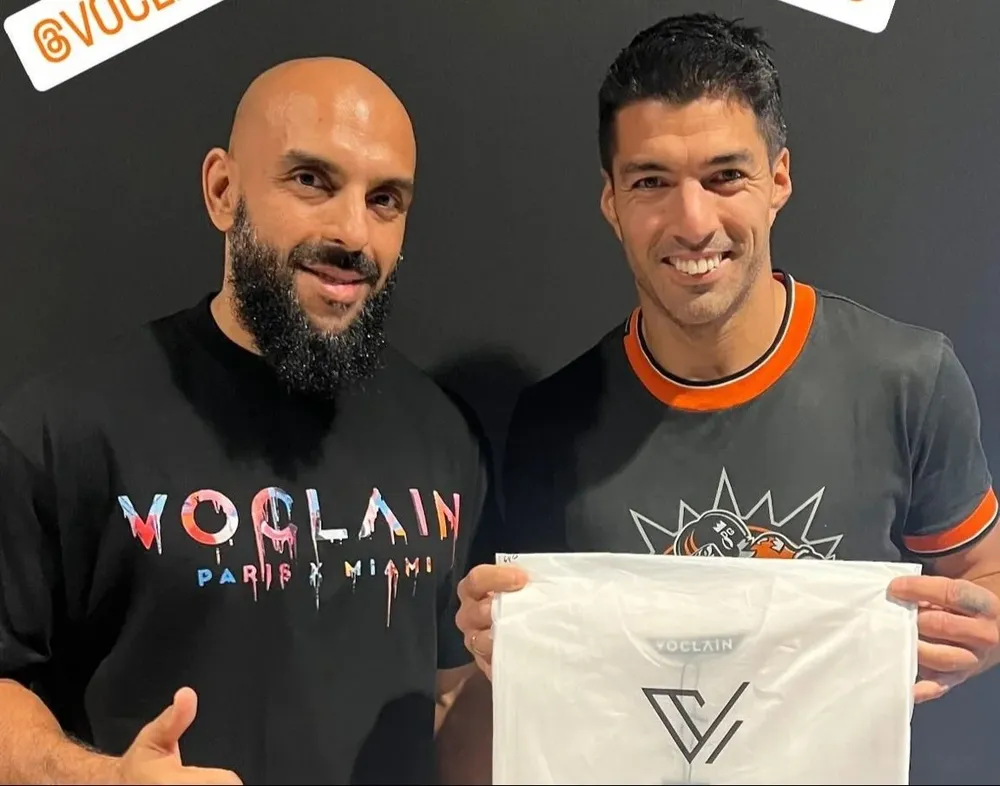 Cheuko y Luis Suárez