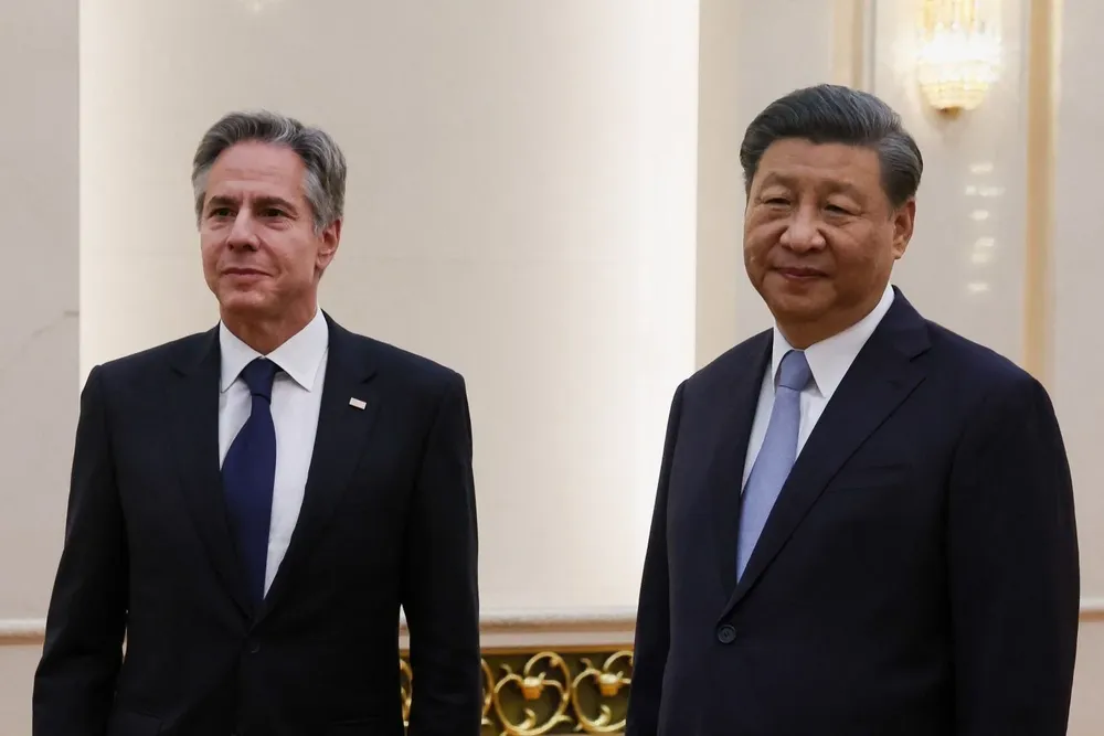 Anthony Blinken y Xi Jinping