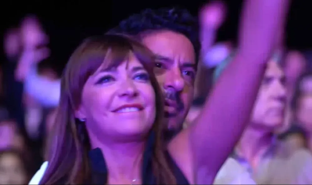 Vignola junto a su pareja