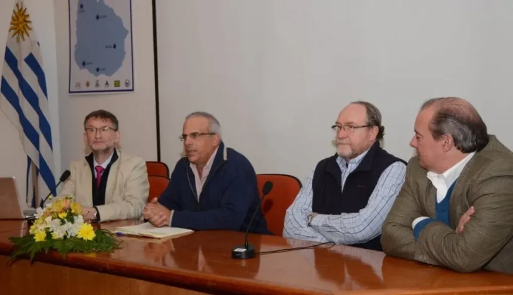 Mark Eisler, presidente de Global Farm Animal Health, y Álvaro Roel, José Silva y Fabio Montossi, de INIA