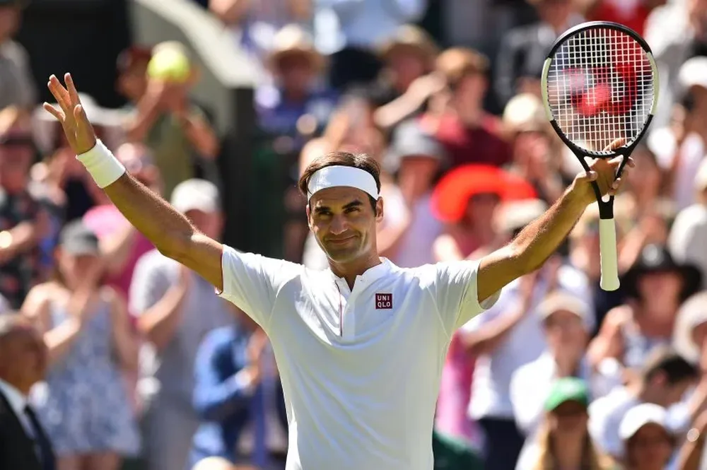 Federer con su nueva indumentaria en Wimbledon